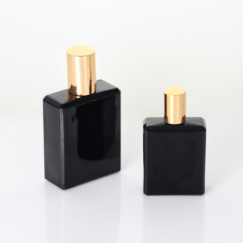 Frasco de perfume com laço preto e dourado